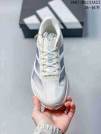 Top view of the sneaker showing the lace-up closure, tongue branding, and textured toe box.