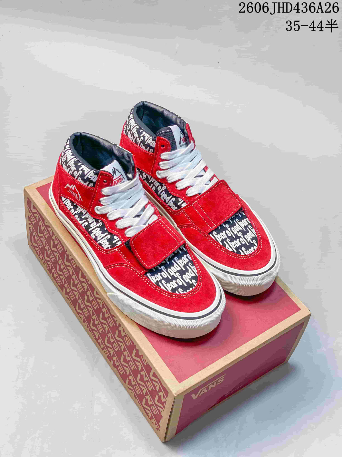 Red Fear of God x Vans Era 95 Reissue sneakers with all-over text print on a Vans box.