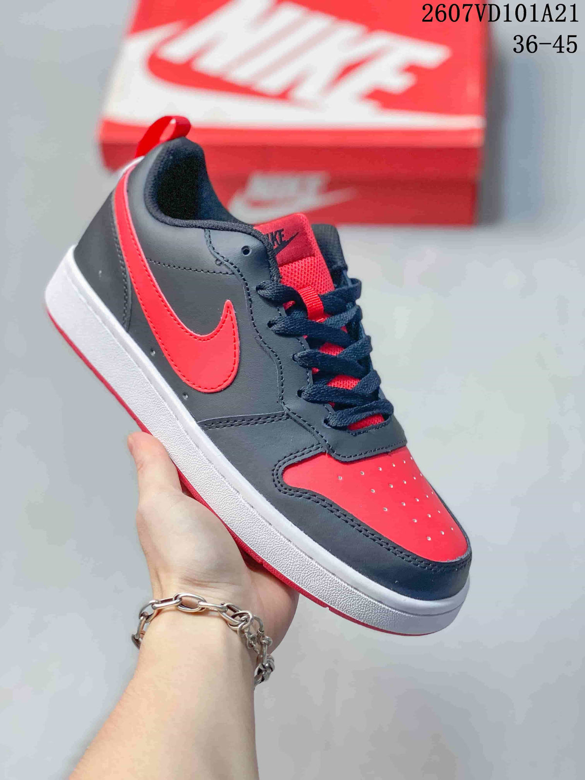 Black and red Nike Court Borough BG sneaker with contrasting laces and Swoosh.