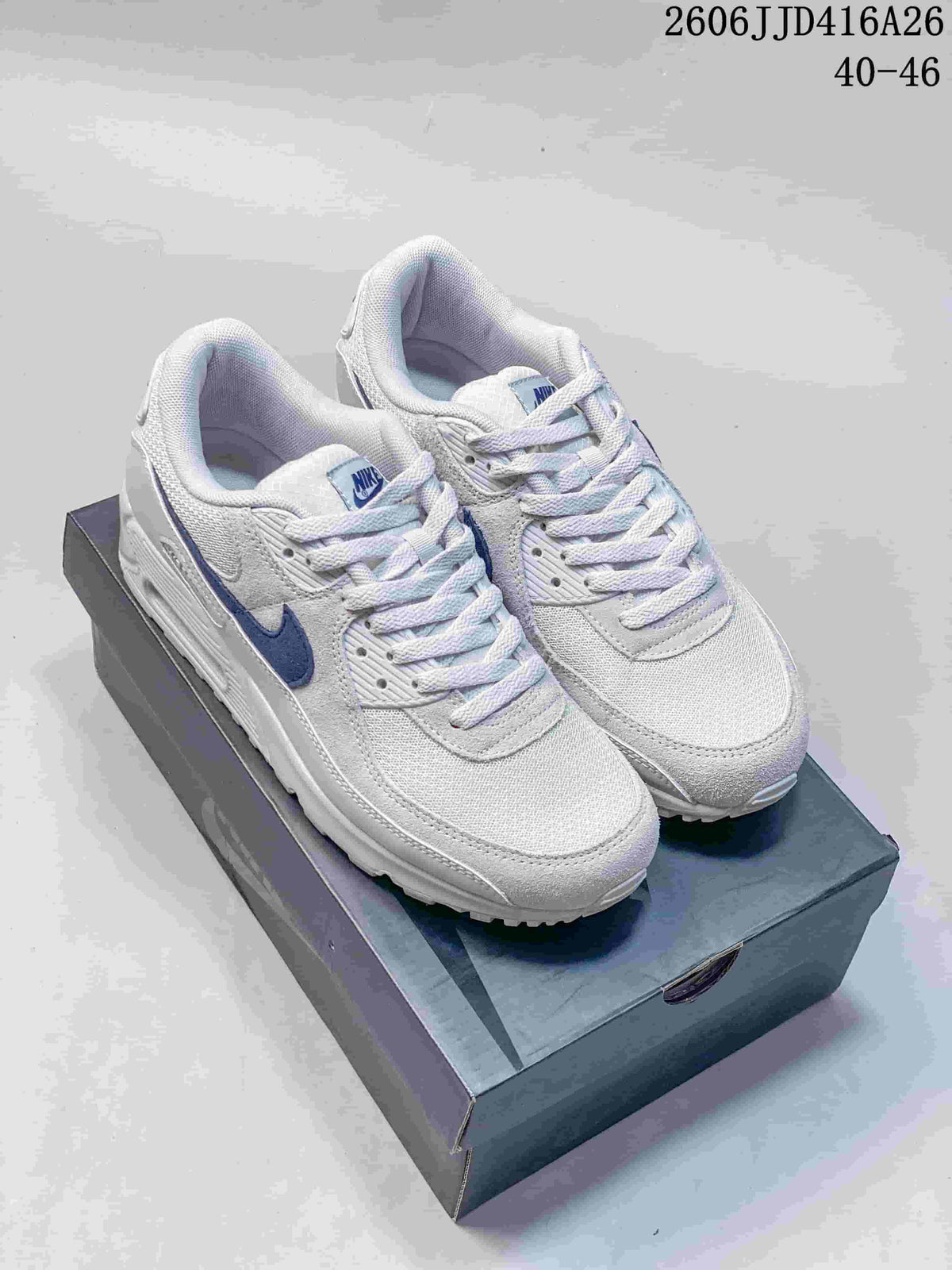 Pair of white and blue Nike Air Max 90 sneakers displayed on a shoebox; the image also shows the text "2606 JJD416A26" and "40–46".