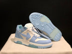 Angled view with one sneaker lifted to display the patterned outsole and translucent blue sections.