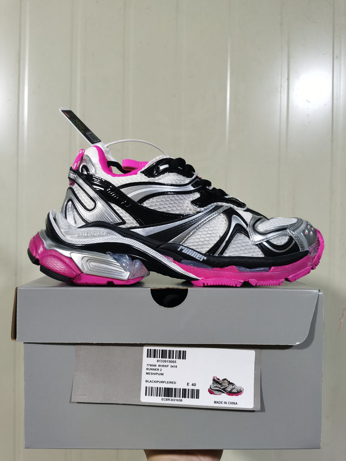 Balenciaga Runner 2 sneaker in black, silver, white, and pink shown on its box; the label identifies Runner 2, color code 5418, and EU size 40.