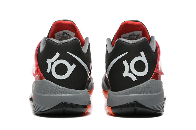 Rear view of black and red Nike KD 4 shoes with gray heels.