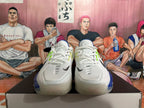 Front view of white Nike GT basketball shoes with white laces and blue accents.