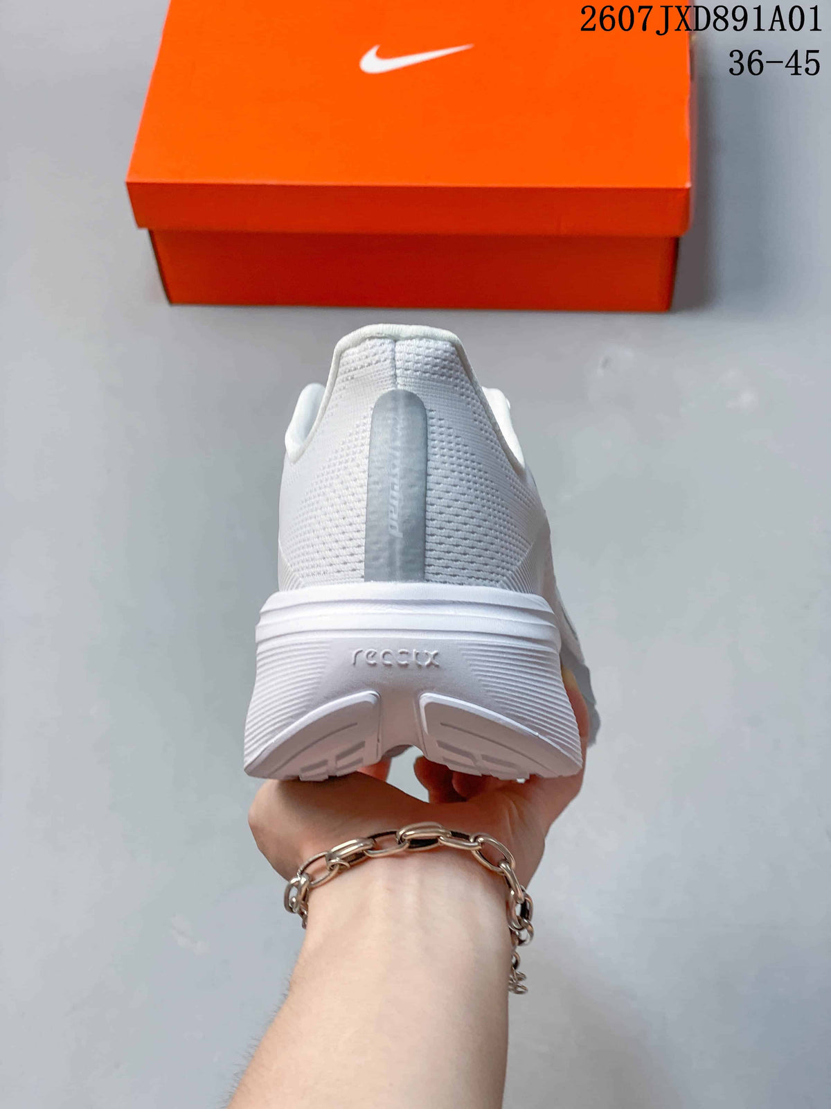 Rear view of the white running shoe showing the heel and sole
