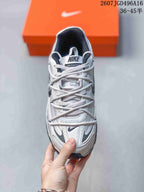 Top view showing the laces, tongue branding and layered toe design of the sneaker.