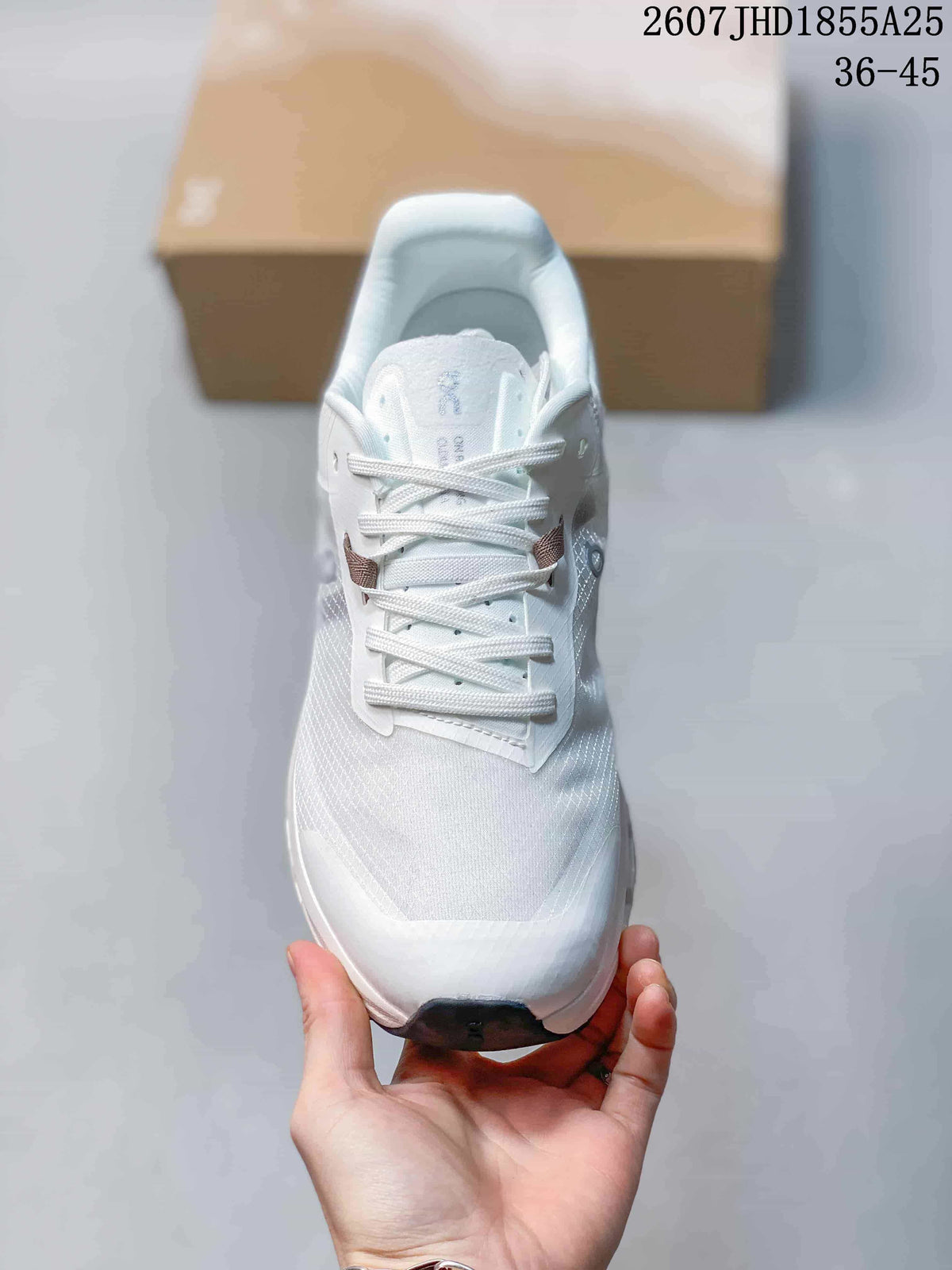 Top view of the white lace-up sneaker showing the tongue, laces, and textured upper; overlay text shows style code 2607 JHD1855A25 and size range 36-45.