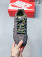 Top view of a dark gray Nike P-6000 sneaker with neon green laces and Nike branding on the tongue.