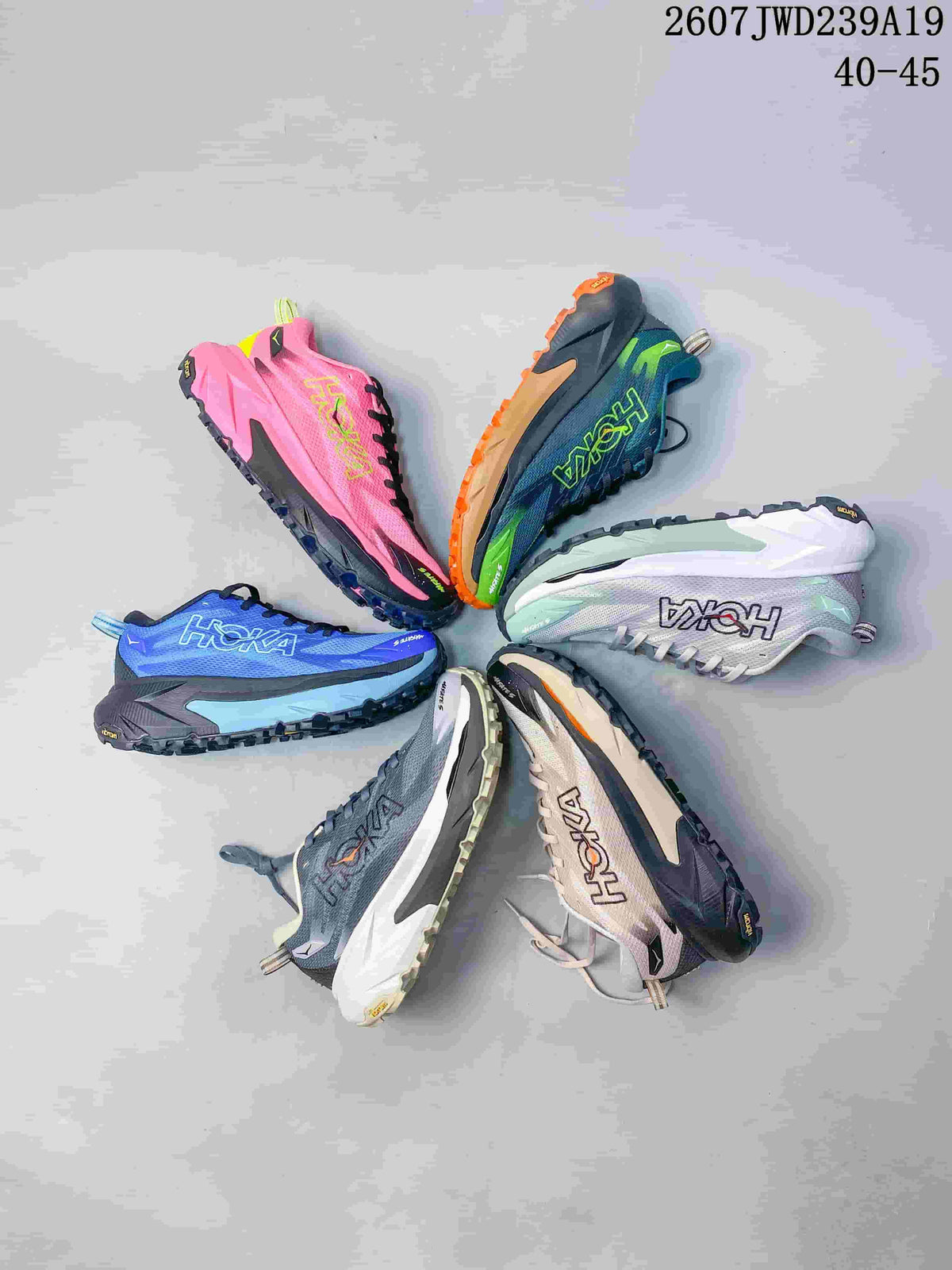 Group view showing six HOKA Rocket X 3 colorways, including pink, blue-green, white, mint, gray, and beige; image text shows code 2607JWD239A19 and sizes 40–45.