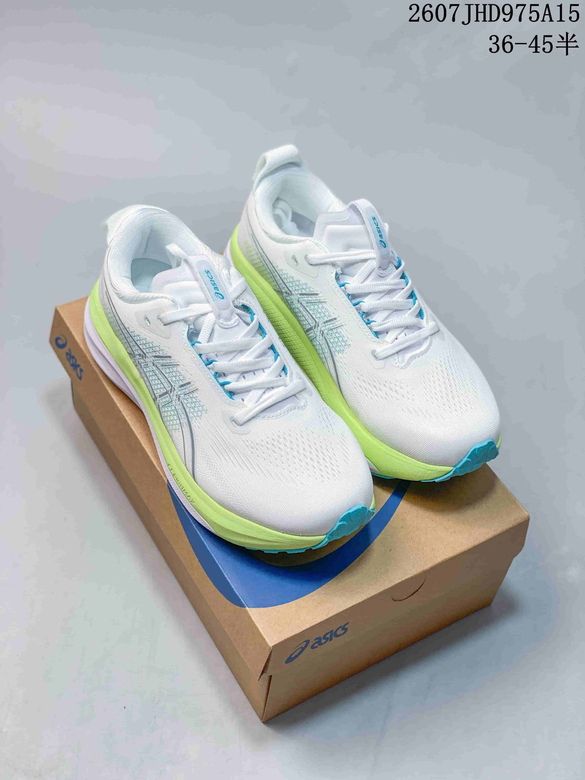 Pair of white ASICS Gel-Kayano 33 running shoes with lime-green midsoles and turquoise-blue outsole accents on an ASICS shoe box.