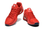 Pair of red Nike Sabrina basketball shoes viewed from the front.