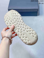 Close-up of the sandal outsole showing its raised tread pattern.