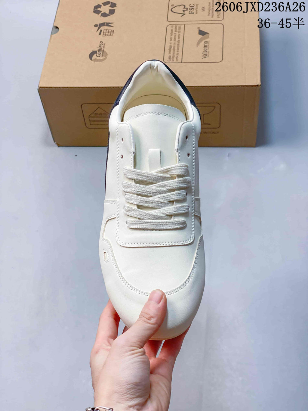 Top view showing the rounded toe and white laces.