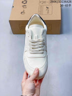 Top view showing the rounded toe and white laces.