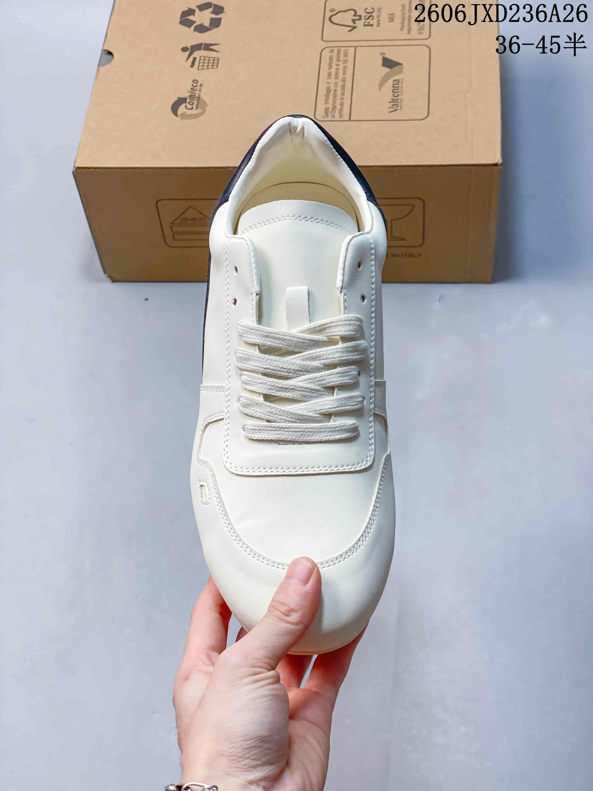 Top view showing the rounded toe and white laces.
