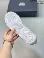 Underside view showing the white circular-groove outsole pattern and textured perimeter.