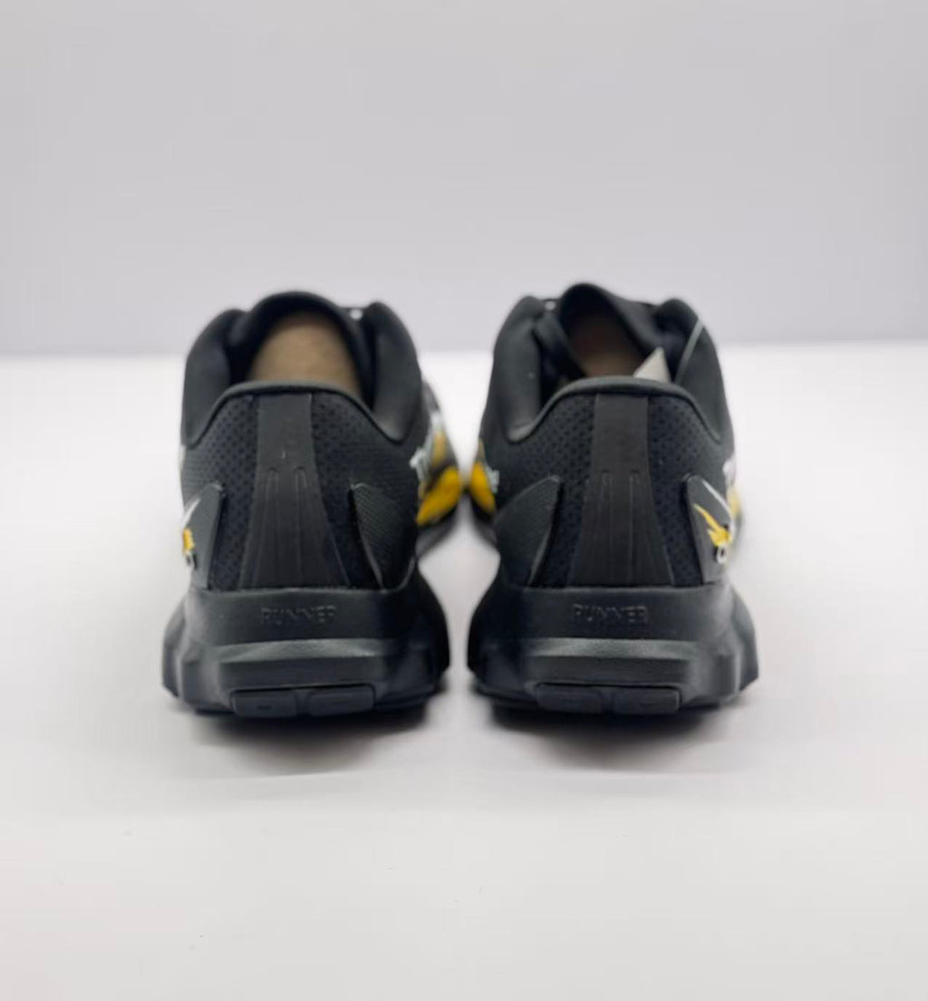 Rear view of the pair showing black heel panels, heel counters and outsole tread edges.