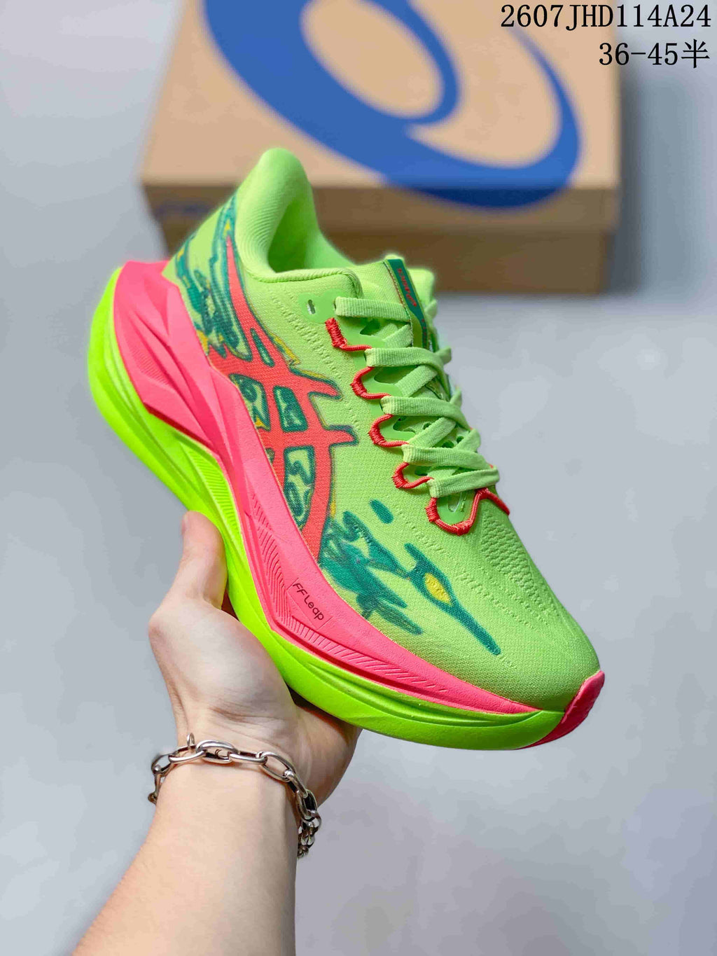 Angled side view of the lime green and pink ASICS SUPERBLAST 3 sneaker.