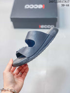 Side view of the sandal showing the two strap construction, buckle hardware, open toe, and sole profile.