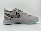 Side profile highlighting the textured panels and contrasting Swoosh