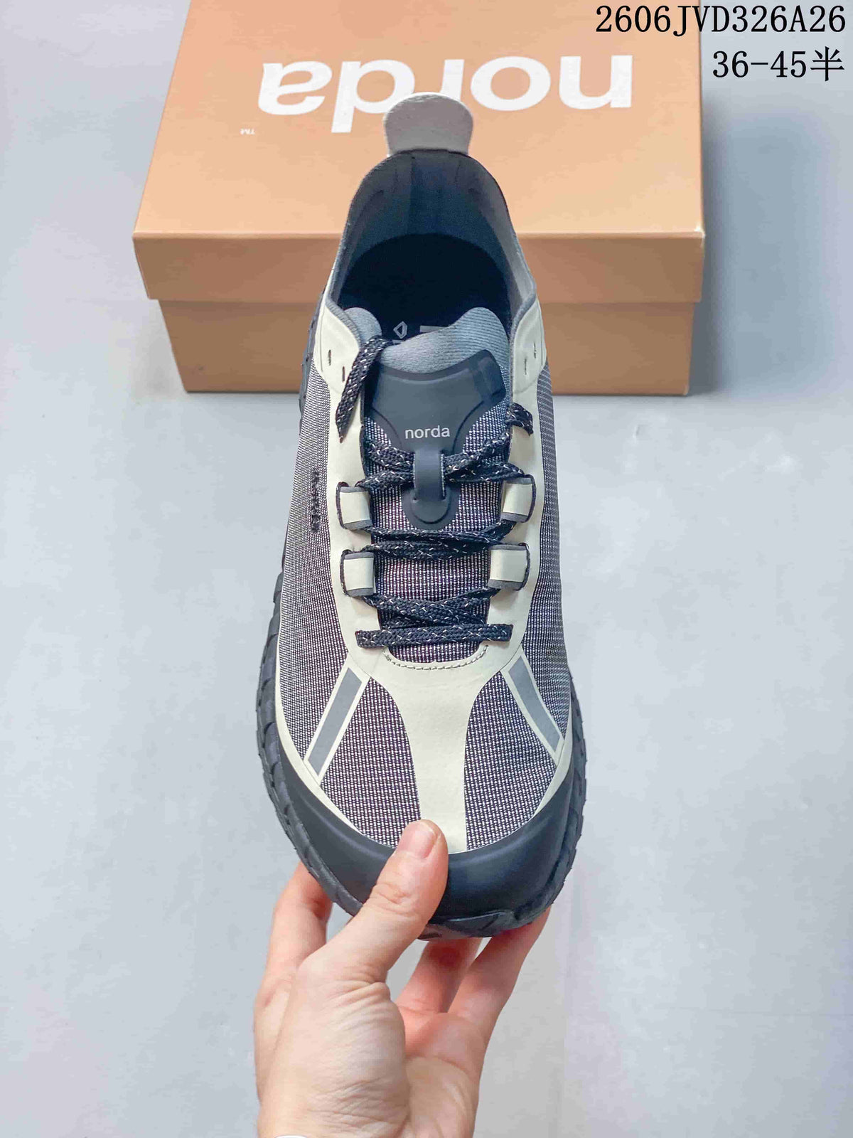 Top view showing the lace-up front and mixed gray and off-white panels.