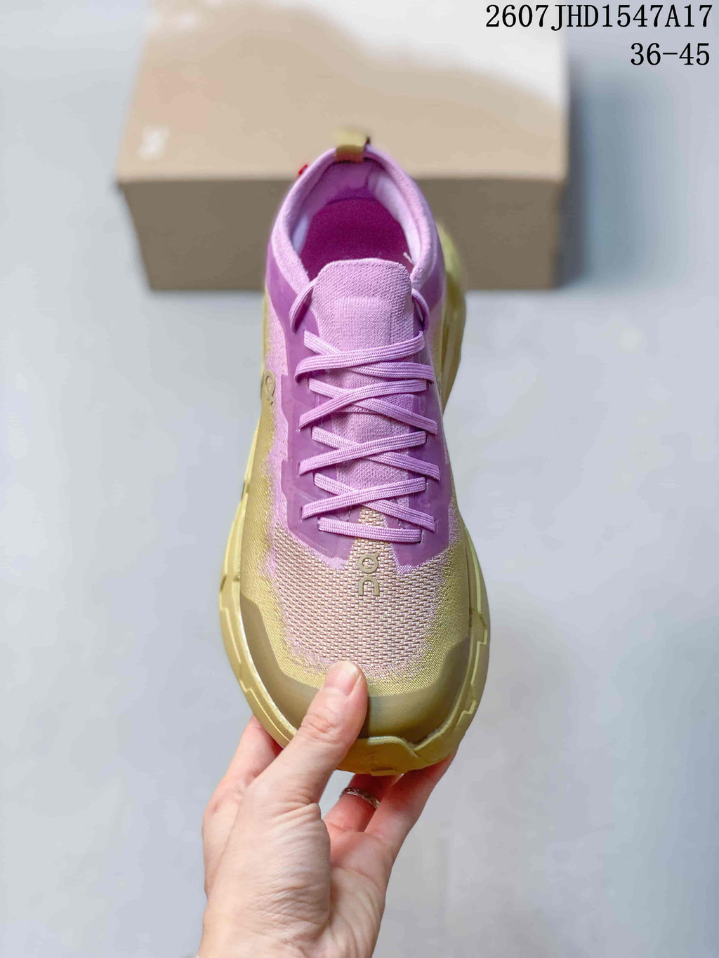 Top view of the sneaker showing the lace-up design, textured forefoot, padded tongue, and color-blocked upper.