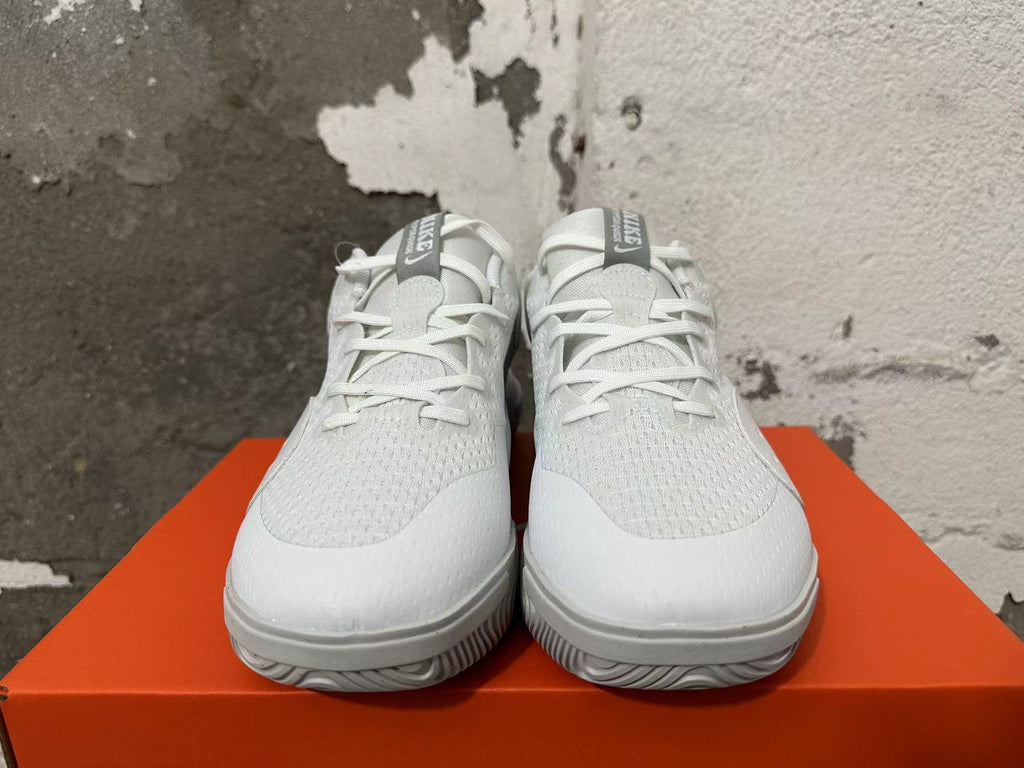 Front view showing the lace-up closure and textured uppers of the Nike Hyperquick shoes