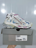 Balenciaga Runner 3120 sneaker in white with pink and blue accents displayed on its box; the box label shows size E 40.