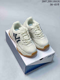 Pair of off-white MLB Bigball Chunky Window sneakers displayed on an MLB shoe box, showing dark side branding and gum-colored outsoles.