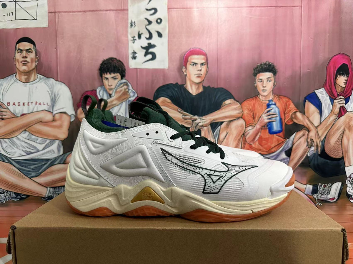 Side view of white Mizuno Wave Momentum 3 volleyball shoes with dark green laces and gum-colored outsole