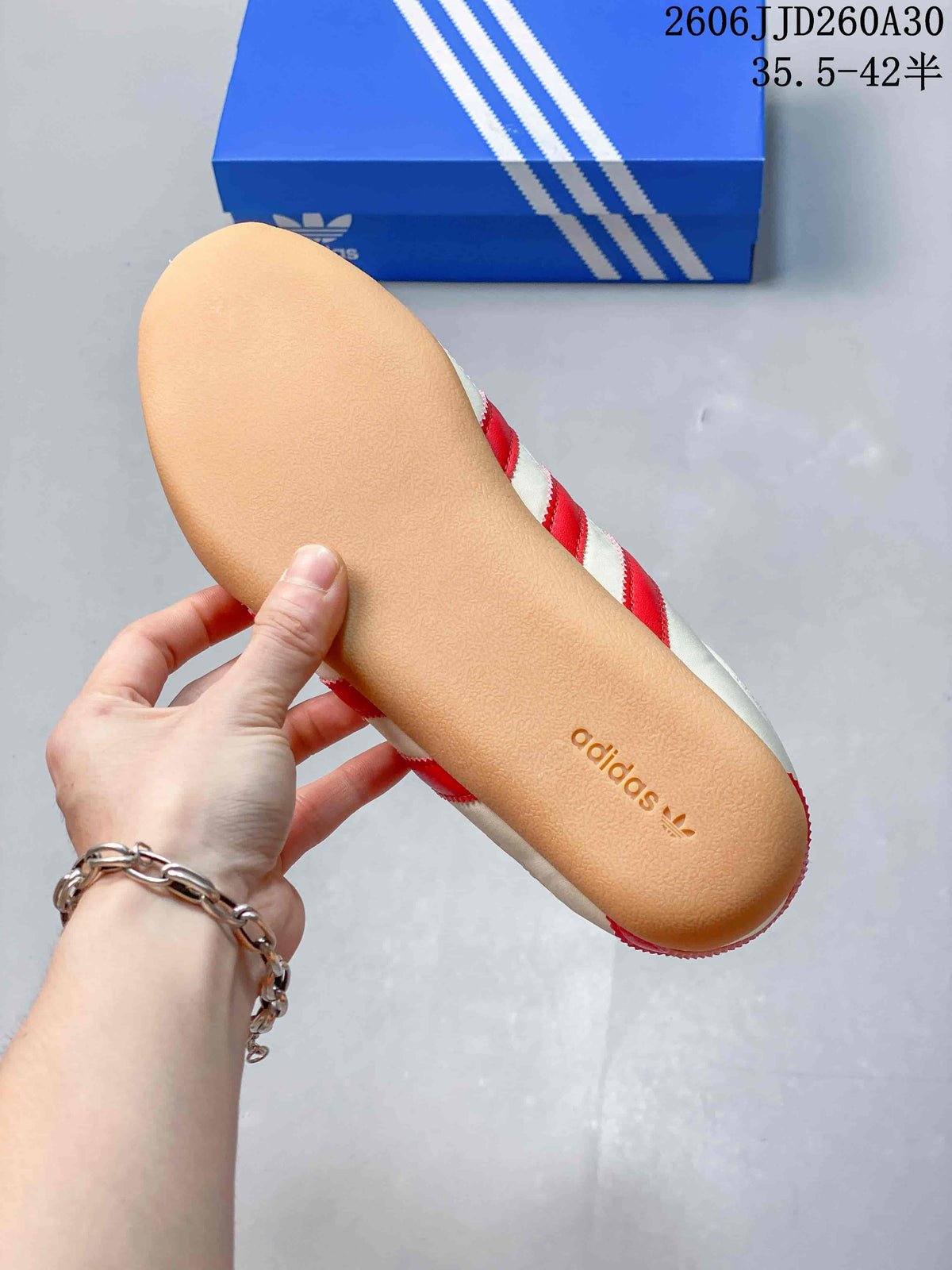 Close view of the gum-colored sole on an adidas Originals Tokyo MJ sneaker.