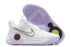 White basketball shoe with green Swoosh, lavender outsole, and contrasting heel detail.