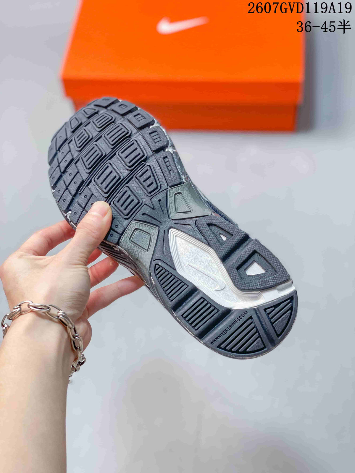 Close view of the segmented patterned outsole on a Nike Initiator sneaker.