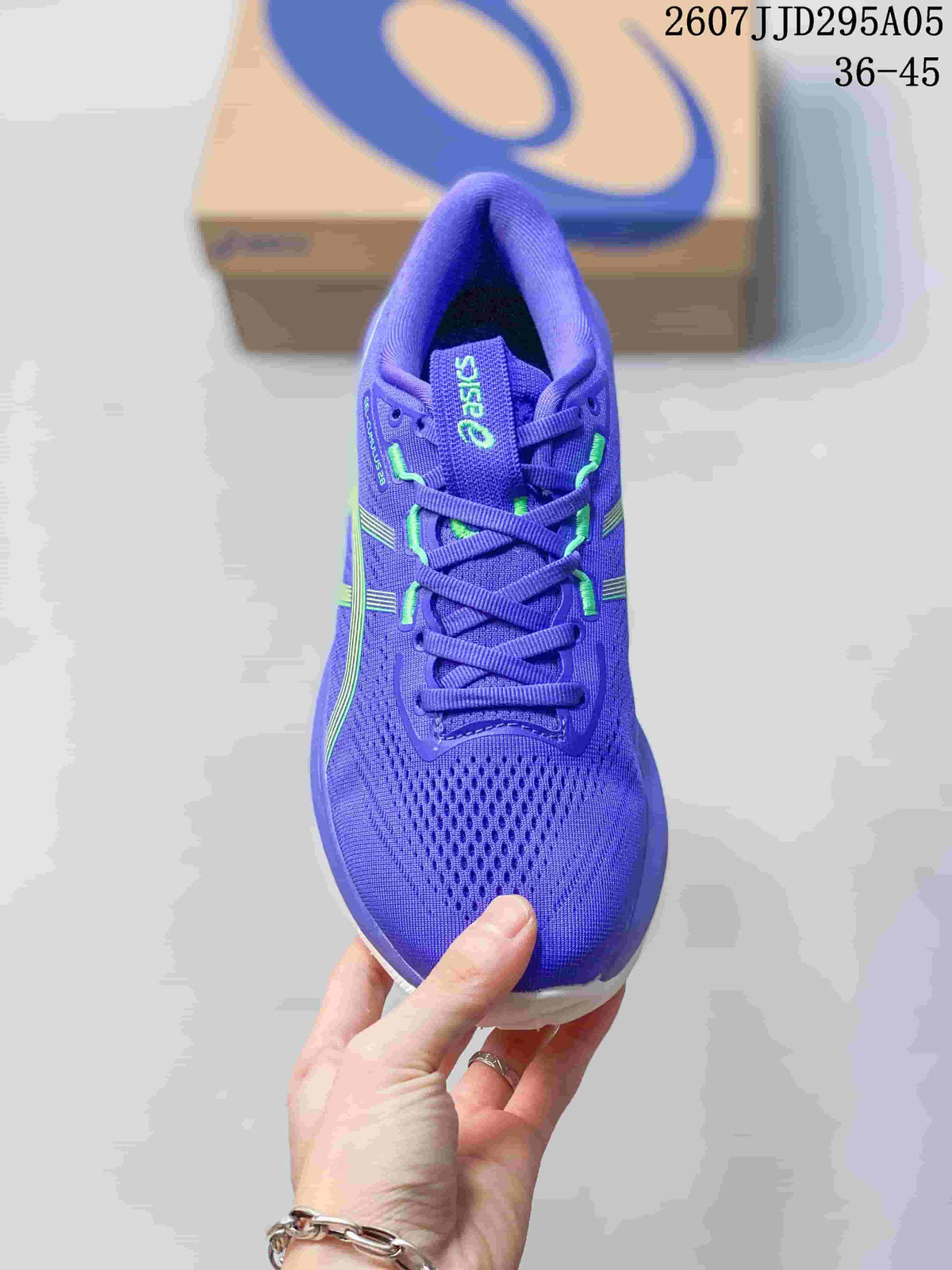 Top view of the purple sneaker showing the perforated knit-mesh toe box, laces, and lime accents.