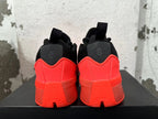 Rear view of red-and-black Dame 9 basketball shoes