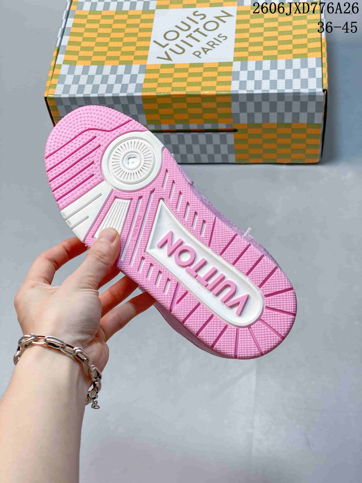 Pink and white sneaker outsole with molded tread, shown beside a patterned box