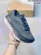 Dark gray and black On Cloudsurfer 3 sneaker with a contrasting white sculpted outsole.