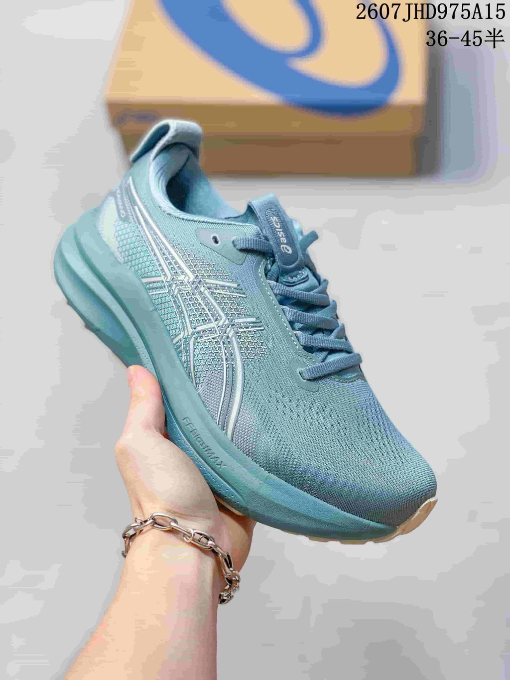 Angled side view of the blue-teal sneaker showing the patterned upper, raised midsole, and outsole.