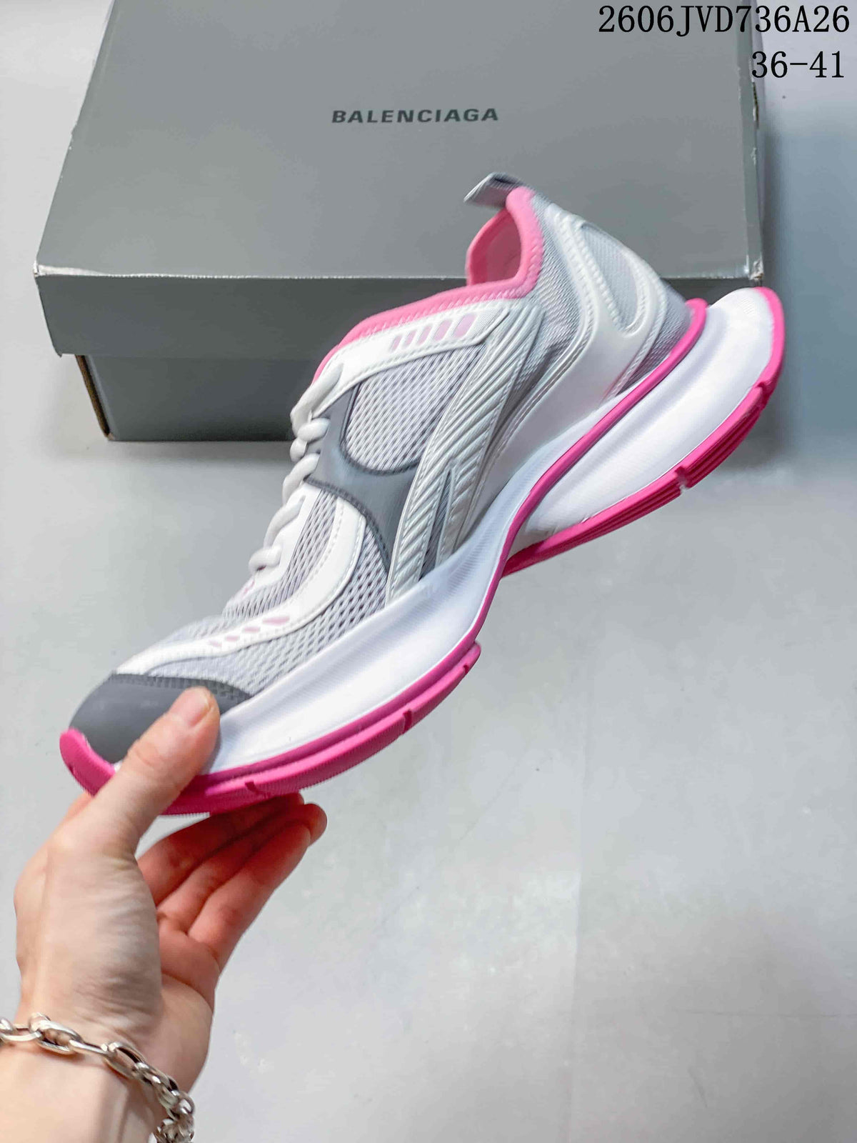Side profile showing the layered panels and chunky sole