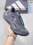 Angled side view of a dark gray Adidas Holo Peak shoe