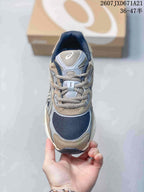 Top view of the Asics sneaker showing the mesh toe box, layered upper, tongue, and laces.
