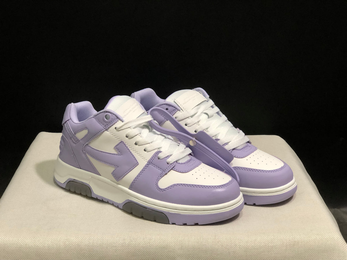 Front three-quarter view of the pair with lavender overlays, white uppers, and contrasting soles.