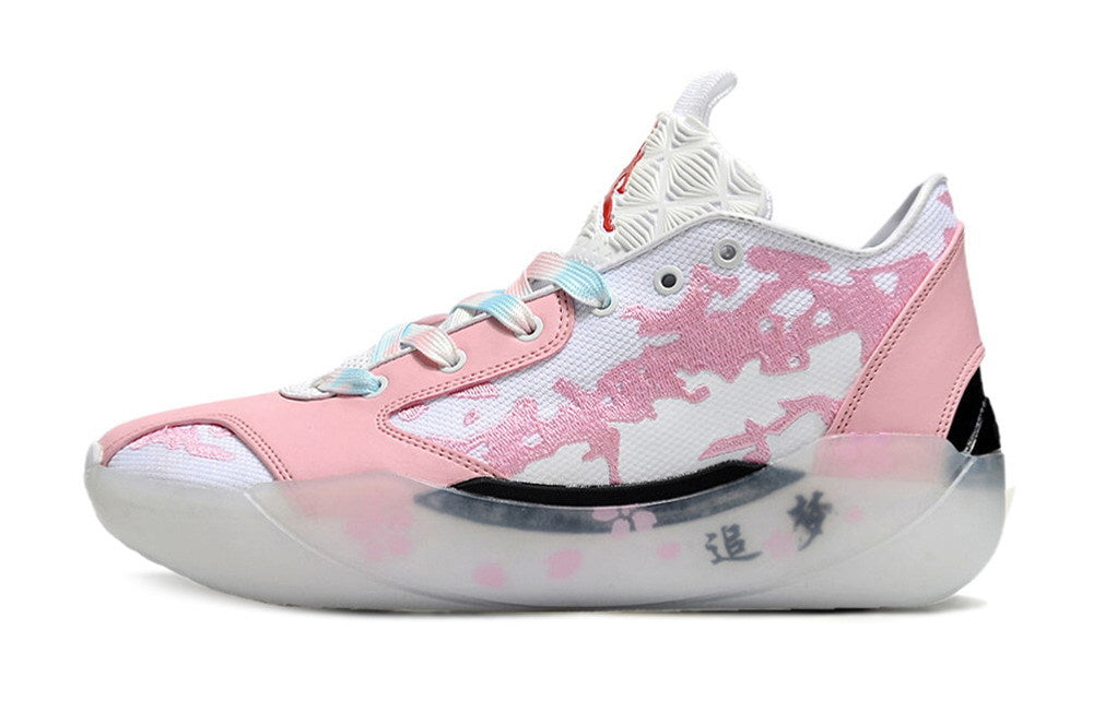 Profile of a pink and white Jordan Luka 39 shoe