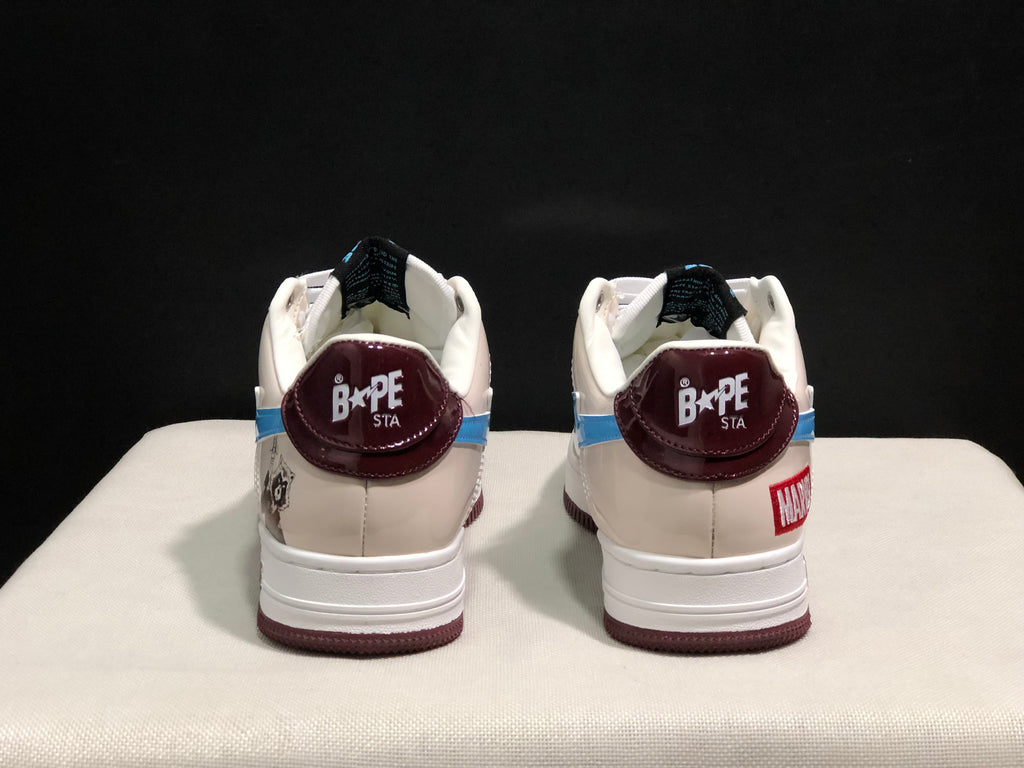 Rear view of the pair showing burgundy Bape Sta heel panels, white padded collars, and contrasting heel graphics.