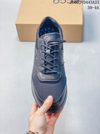 Front view of the lace-up sneaker with mesh toe panel