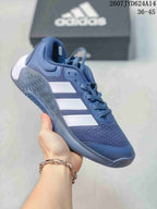 Navy blue adidas Dropset 4 training shoe with white side stripes and a dark outsole.