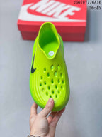 Top view of the neon green clog showing the open slip-on collar and ventilation holes.