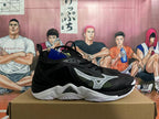 Lateral side view of a black Mizuno Wave Momentum 3 shoe with white detailing.