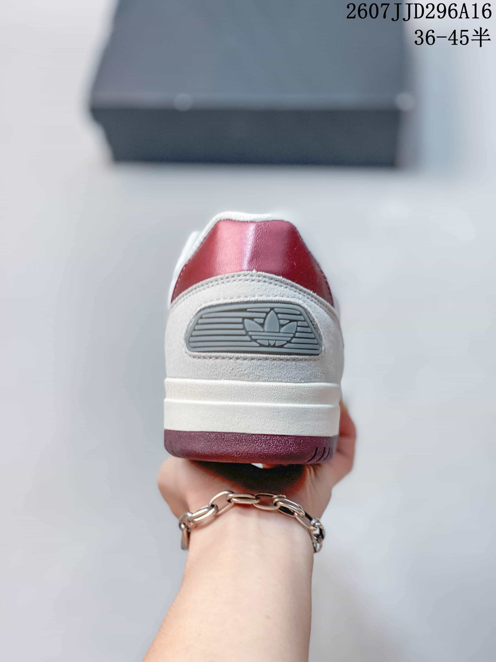 Rear view showing the white heel, red heel tab and adidas trefoil detail.
