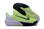 Nike basketball shoes shown with the patterned black, volt yellow-green, and white outsole visible.